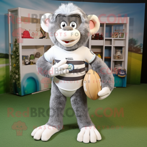 Silver Monkey mascot costume character dressed with a Rugby Shirt and Tote bags