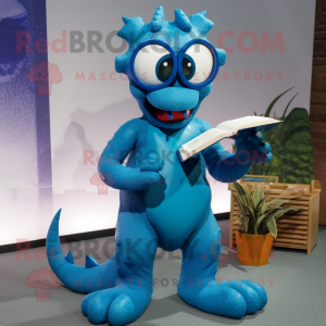 Blue Hydra mascot costume character dressed with a Playsuit and Reading glasses