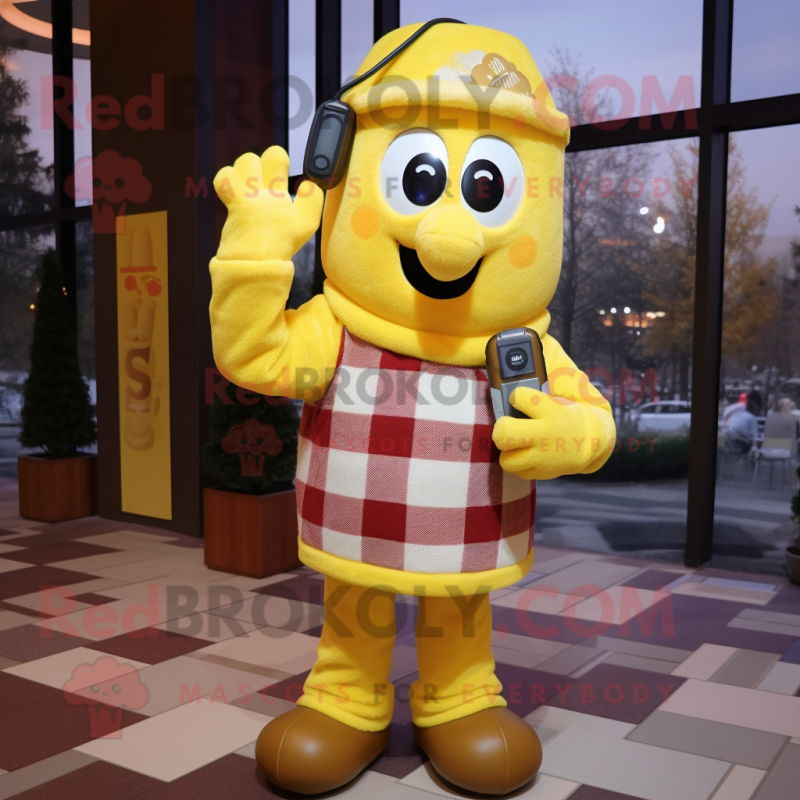 Yellow Phone mascot costume character dressed with a Flannel Shirt and Mittens Yellow Phone mascot costume character dressed with a Flannel Shirt and Mittens