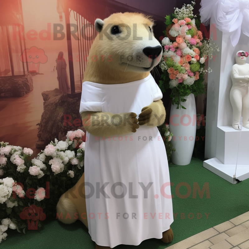 Cream Capybara mascot costume character dressed with a Wedding Dress and Foot pads