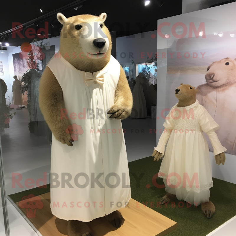 Cream Capybara mascot costume character dressed with a Wedding Dress and Foot pads