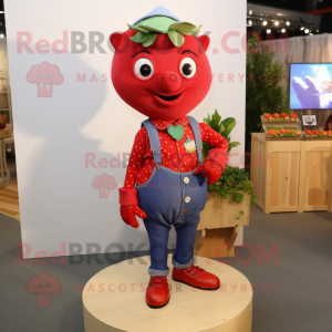 Red Strawberry mascot costume character dressed with a Chambray Shirt and Necklaces