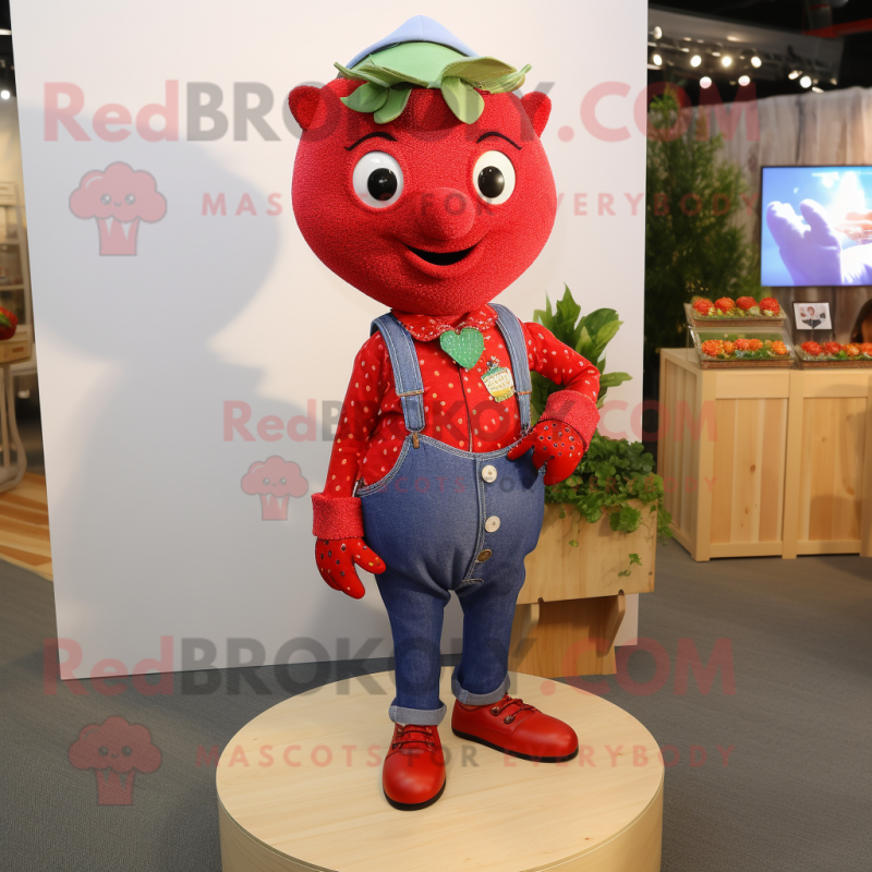 Red Strawberry mascot costume character dressed with a Chambray Shirt and Necklaces Red Strawberry mascot costume character dressed with a Chambray Shirt and Necklaces