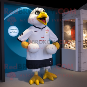 Cream Pigeon mascot costume character dressed with a Rugby Shirt and Rings