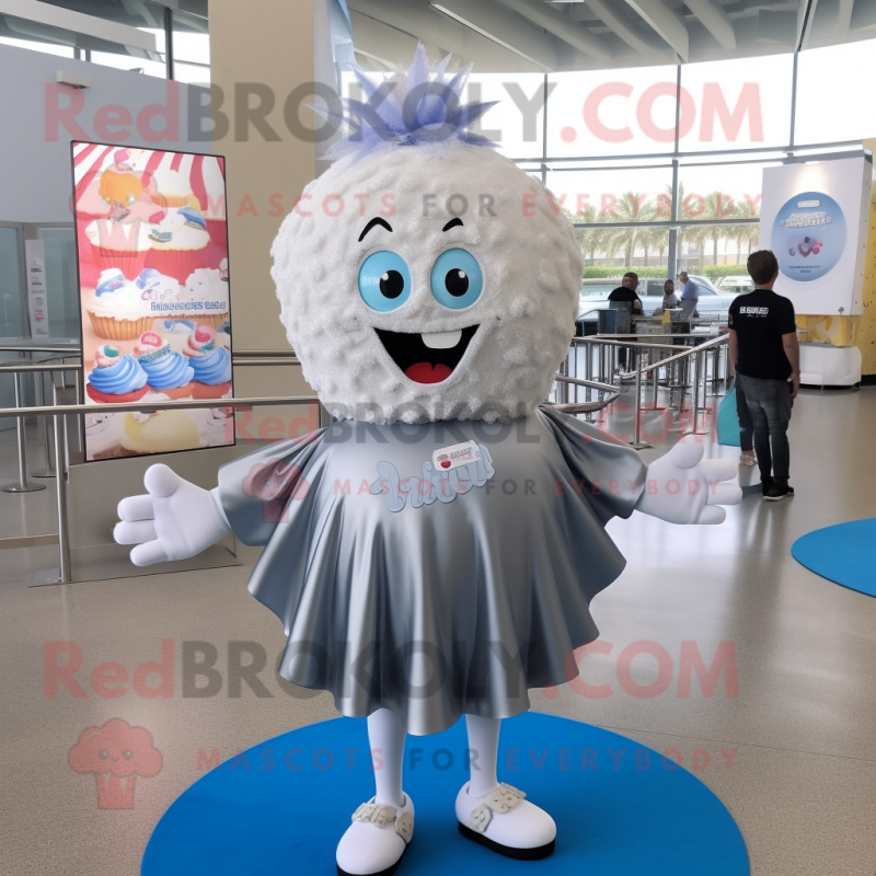 Silver Cupcake mascot costume character dressed with a Swimwear and Shoe clips