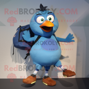 Sky Blue Blackbird mascot costume character dressed with a Running Shorts and Backpacks