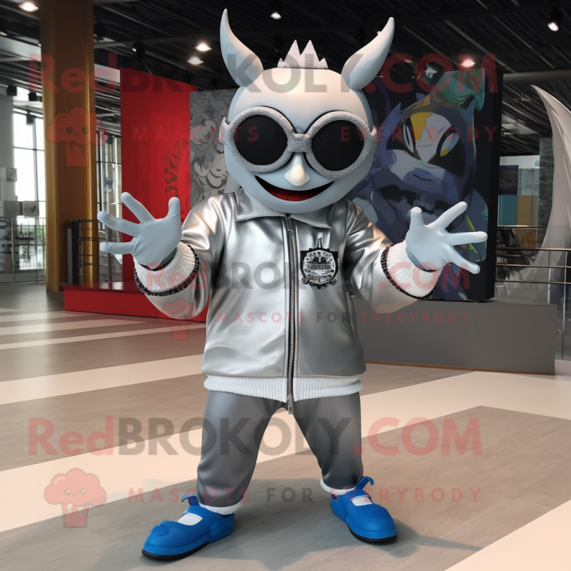 Silver Demon mascot costume character dressed with a Windbreaker and Sunglasses