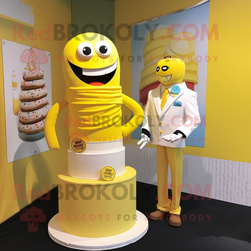 Yellow Wedding Cake mascot costume character dressed with a T-Shirt and Ties Yellow Wedding Cake mascot costume character dressed with a T-Shirt and Ties