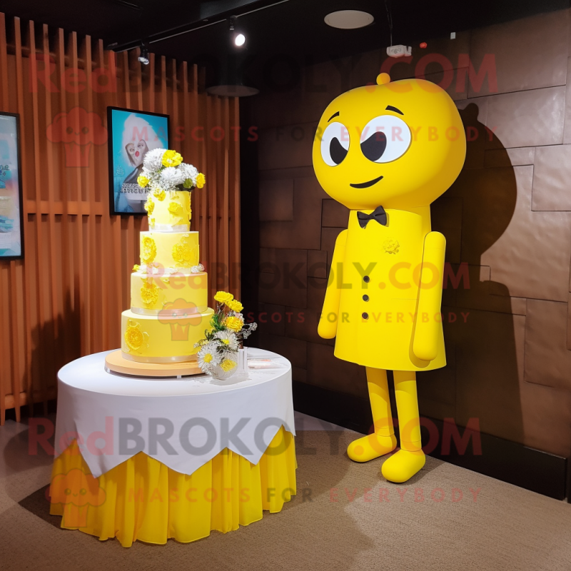Yellow Wedding Cake mascot costume character dressed with a T-Shirt and Ties Yellow Wedding Cake mascot costume character dressed with a T-Shirt and Ties
