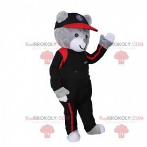 Mascota del oso de peluche gris vestida como piloto. Disfraz de