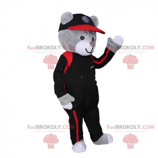 Graues Teddybärmaskottchen als Pilot verkleidet. Bärenkostüm -