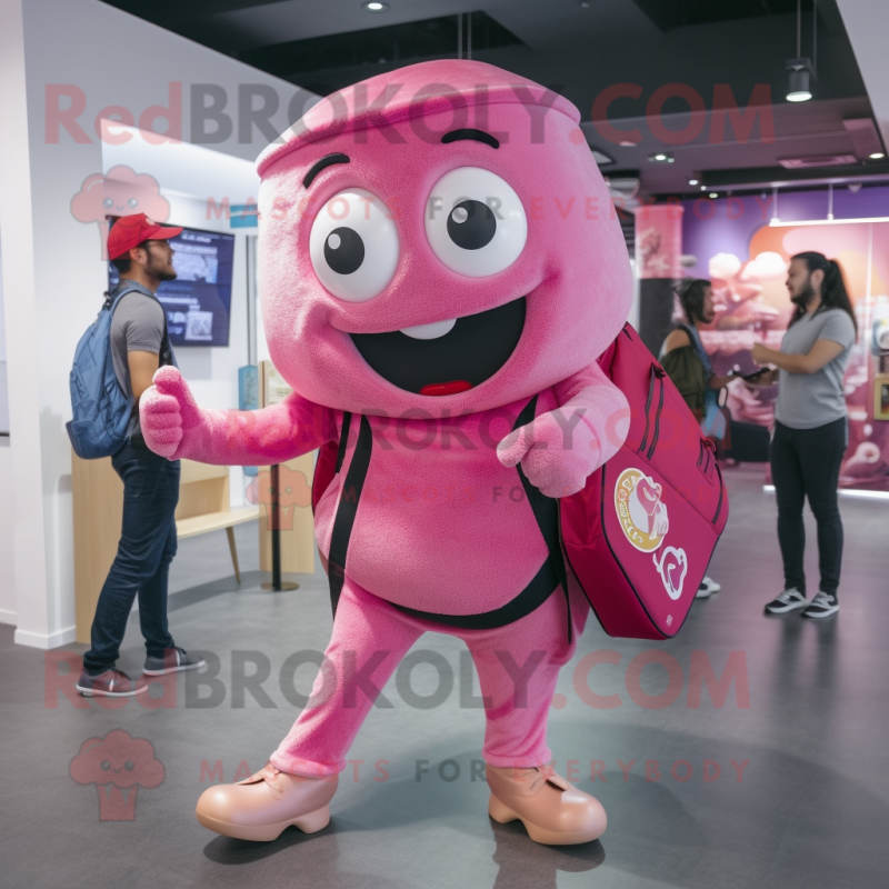 Pink Pizza mascot costume character dressed with a Trousers and Messenger bags