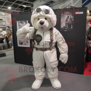 White Special Air Service mascot costume character dressed with a Dungarees and Lapel pins