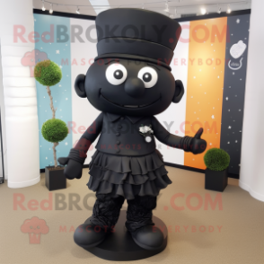 Black Wedding Cake mascot costume character dressed with a Jeggings and Lapel pins