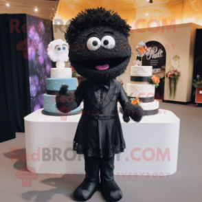 Black Wedding Cake mascot costume character dressed with a Jeggings and Lapel pins