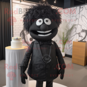 Black Wedding Cake mascot costume character dressed with a Jeggings and Lapel pins