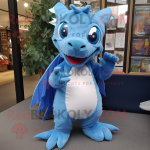 Sky Blue Dragon mascot costume character dressed with a Playsuit and Shawl pins