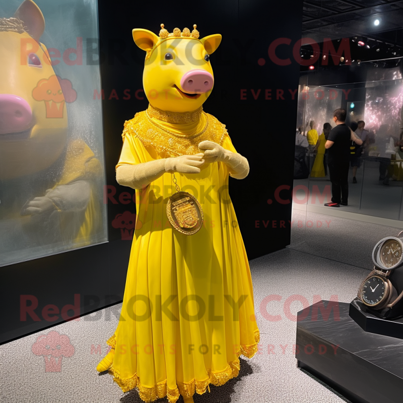 Yellow Sow mascot costume character dressed with a Evening Gown and Bracelet watches