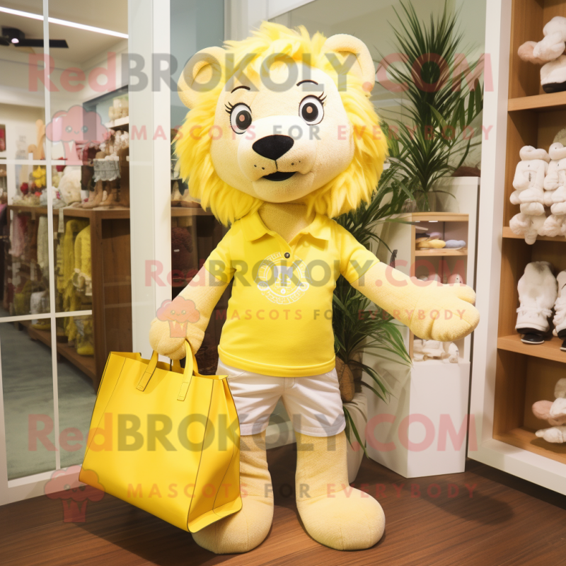 Lemon Yellow Lion mascot costume character dressed with a Blouse and Tote bags Lemon Yellow Lion mascot costume character dressed with a Blouse and Tote bags