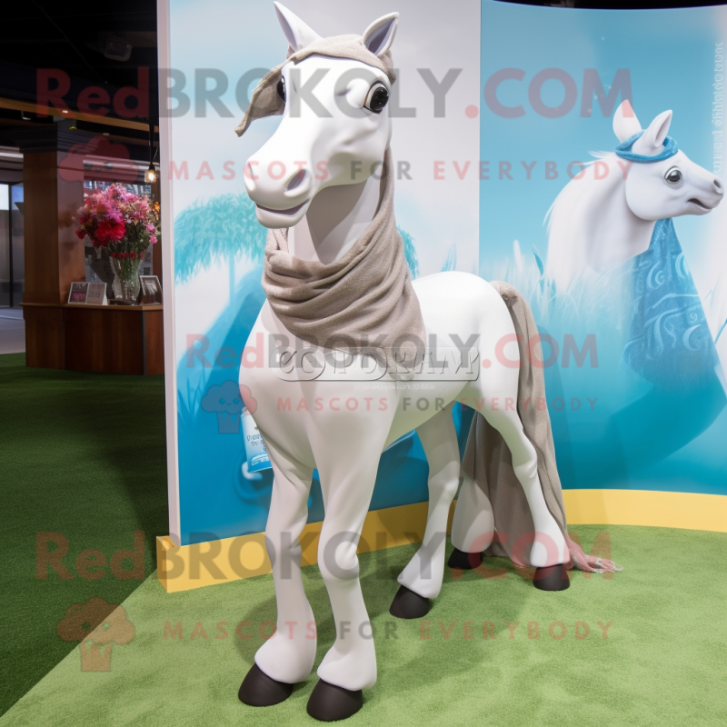 White Horseshoe mascot costume character dressed with a Blouse and Scarves White Horseshoe mascot costume character dressed with a Blouse and Scarves