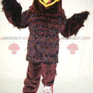 Mascota águila pájaro marrón y amarillo - Redbrokoly.com