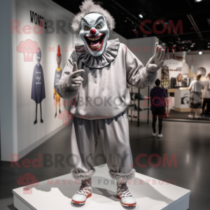 Gray Evil Clown mascot costume character dressed with a Joggers and Shoe laces