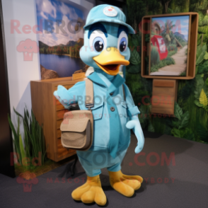 Turquoise Gosling mascot costume character dressed with a Dungarees and Caps