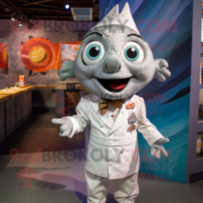 Silver Ceviche mascot costume character dressed with a Dress Shirt and Brooches