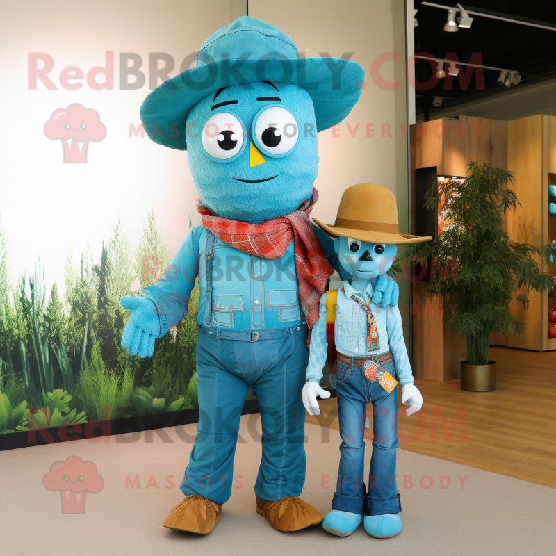 Turquoise Scarecrow mascot costume character dressed with a Boyfriend Jeans and Pocket squares