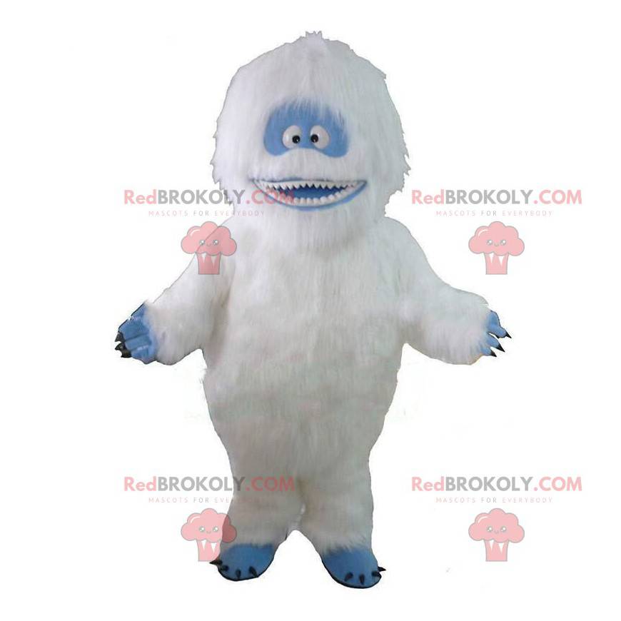 Mascot wit en blauw yeti, erg harig en glimlachend -