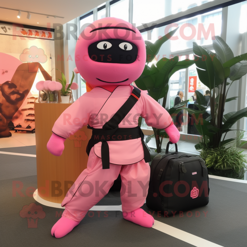 Pink Ninja mascot costume character dressed with a Vest and Handbags Pink Ninja mascot costume character dressed with a Vest and Handbags