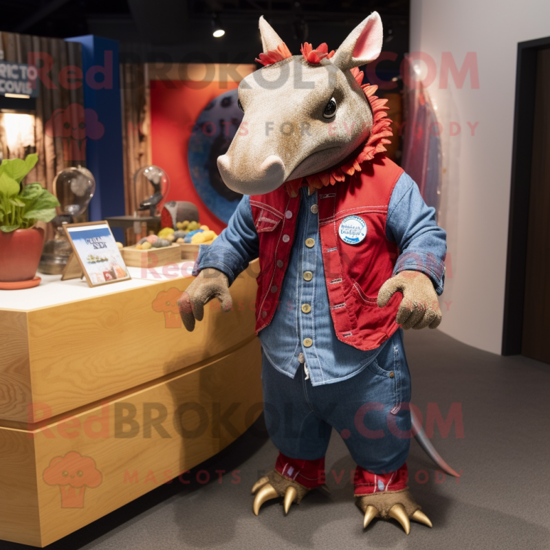 Red Armadillo mascot costume character dressed with a Denim Shirt and Shawl pins