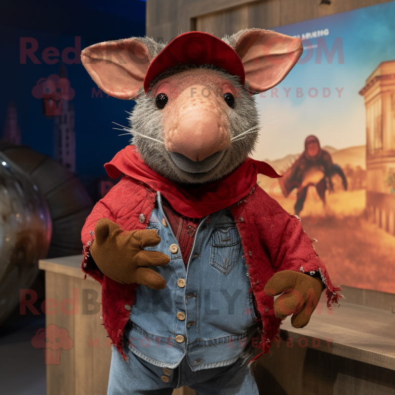 Red Armadillo mascot costume character dressed with a Denim Shirt and Shawl pins