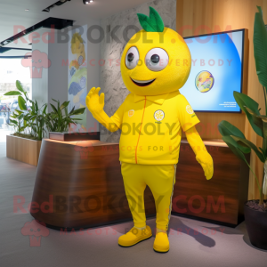 Lemon Yellow Mango mascot costume character dressed with a Rash Guard and Cufflinks