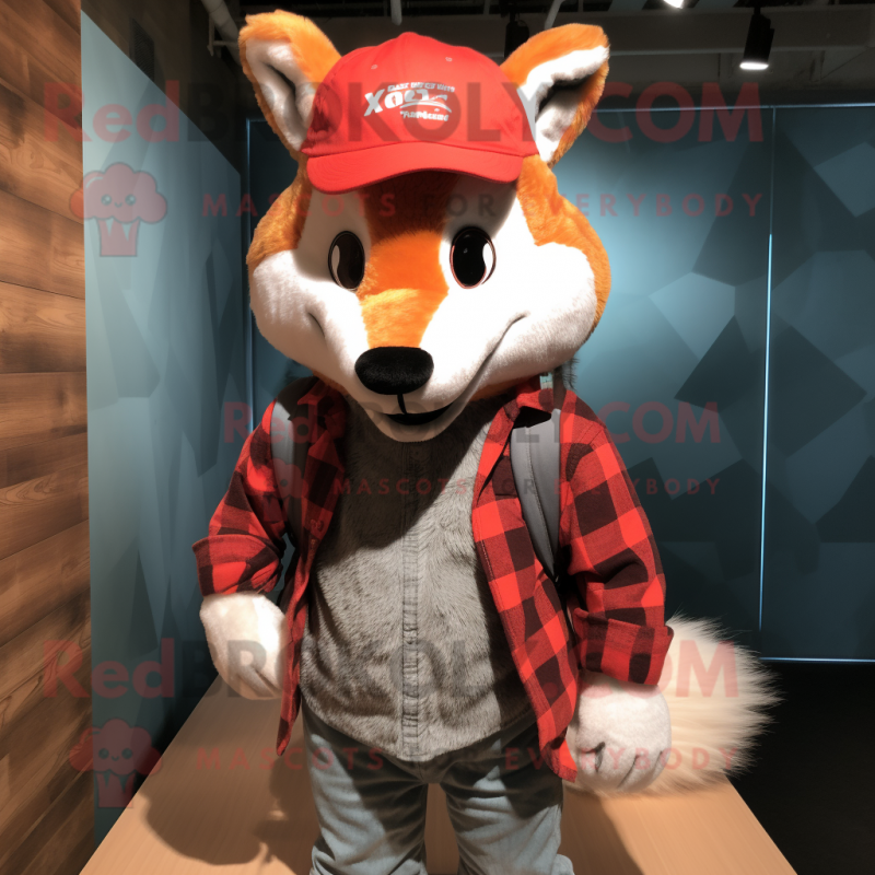 Personaggio del costume della mascotte della volpe rossa vestito con una  camicia di flanella e berretti