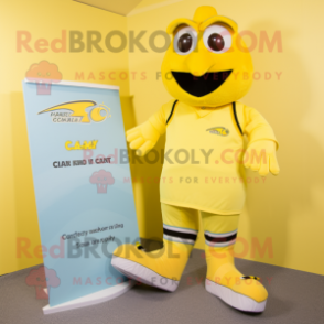 Tan Canary mascot costume character dressed with a Swimwear and Foot pads