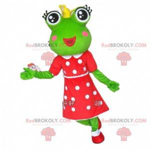 Green frog mascot with a crown and a polka dot dress -