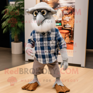 Silver Archeopteryx mascot costume character dressed with a Flannel Shirt and Shoe laces