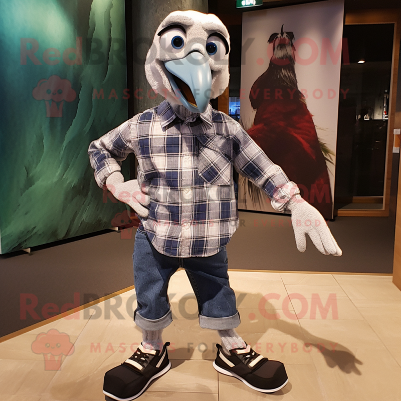 Silver Archeopteryx mascot costume character dressed with a Flannel Shirt and Shoe laces