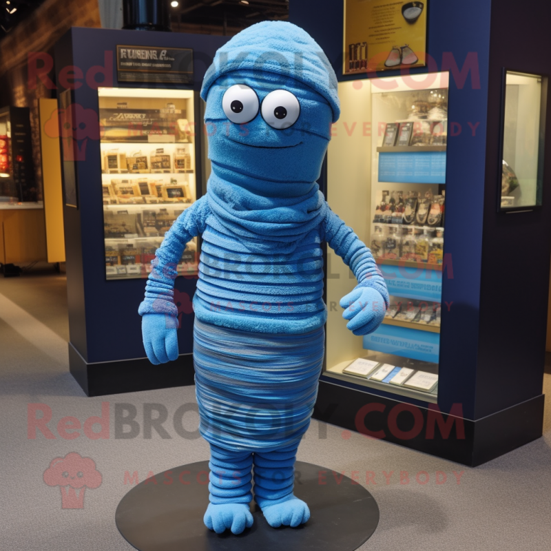 Blue Mummy mascot costume character dressed with a Cardigan and Cummerbunds