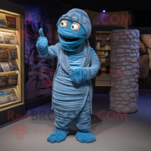 Blue Mummy mascot costume character dressed with a Cardigan and Cummerbunds