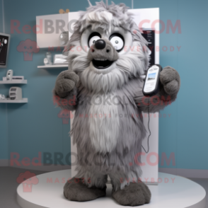 Gray Phone mascot costume character dressed with a Parka and Scarves