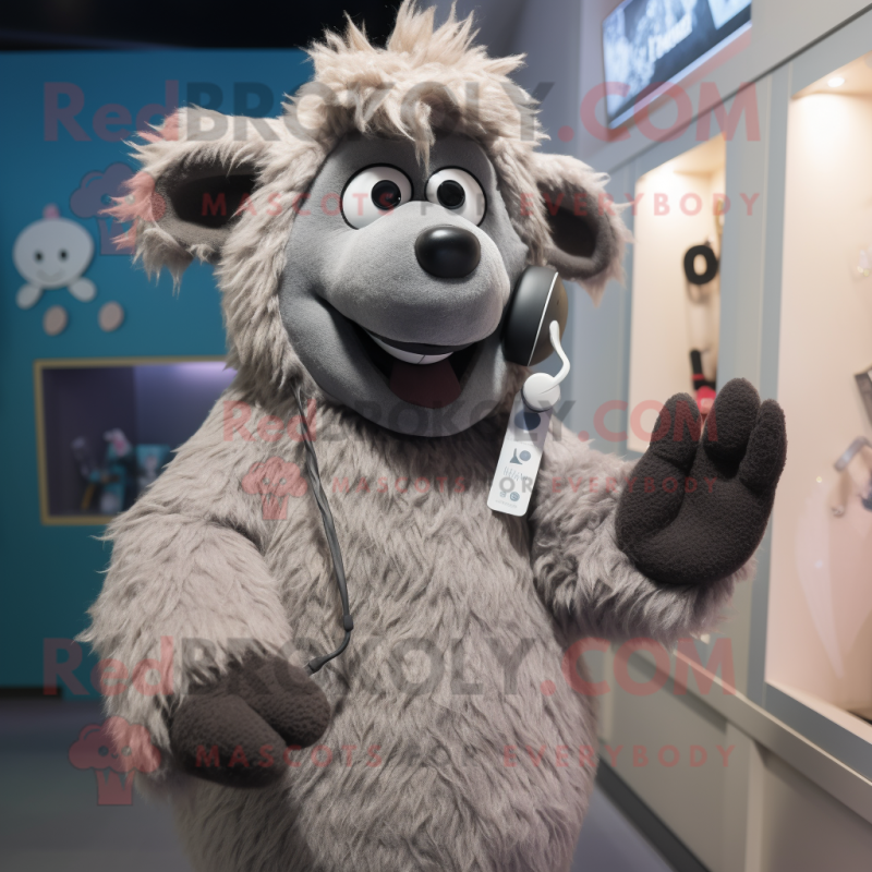 Gray Phone mascot costume character dressed with a Parka and Scarves Gray Phone mascot costume character dressed with a Parka and Scarves