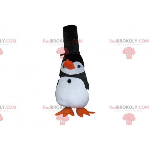 Mascotte pinguino in bianco e nero con un grande cappello nero