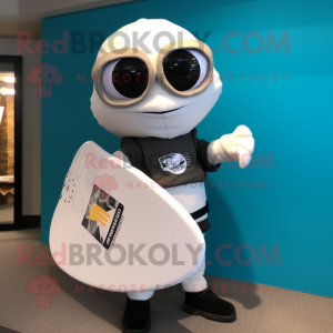 White Surfboard mascot costume character dressed with a Moto Jacket and Messenger bags
