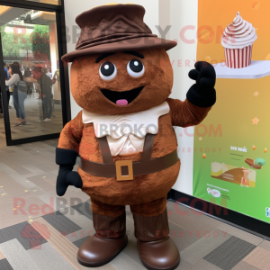 Brown Cupcake mascot costume character dressed with a Vest and Hats