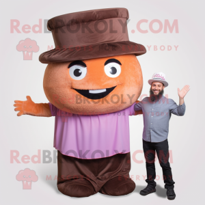 Brown Cupcake mascot costume character dressed with a Vest and Hats