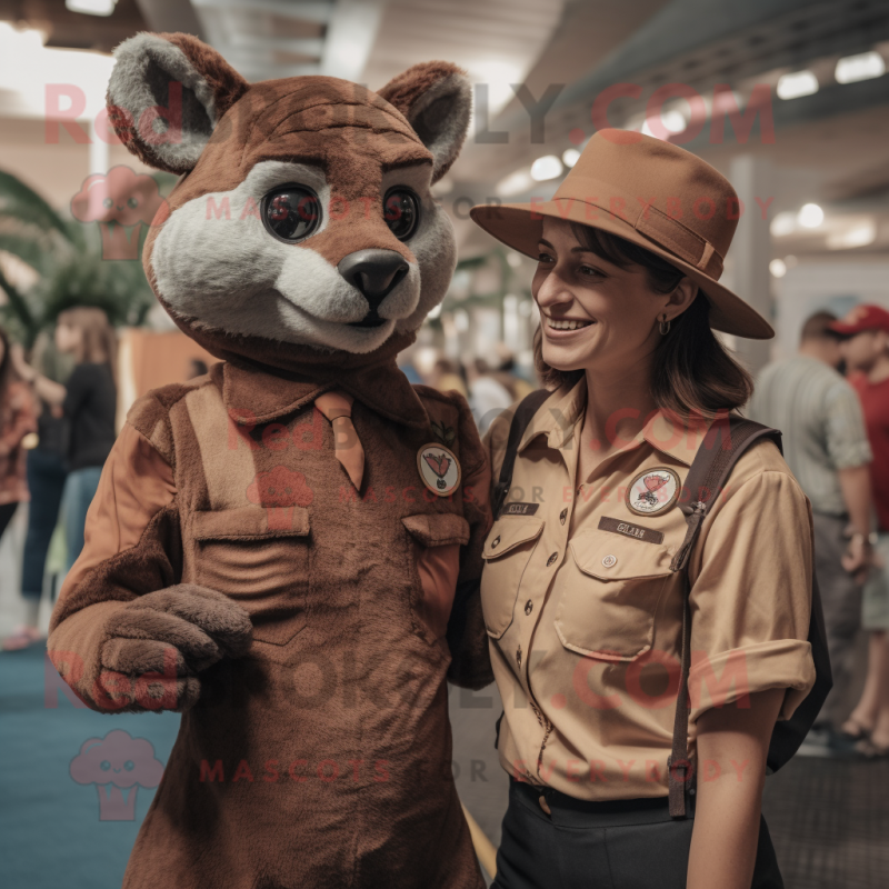 Brown Thylacosmilus mascot costume character dressed with a Mom Jeans and Berets Brown Thylacosmilus mascot costume character dressed with a Mom Jeans and Berets