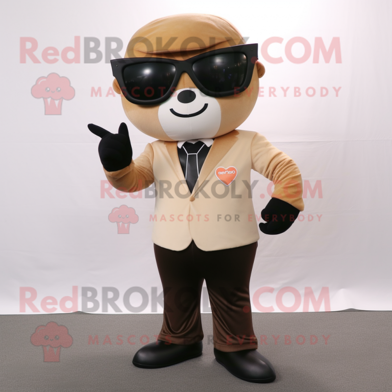 Tan Arrow Of Love mascot costume character dressed with a Suit Pants and Sunglasses Tan Arrow Of Love mascot costume character dressed with a Suit Pants and Sunglasses