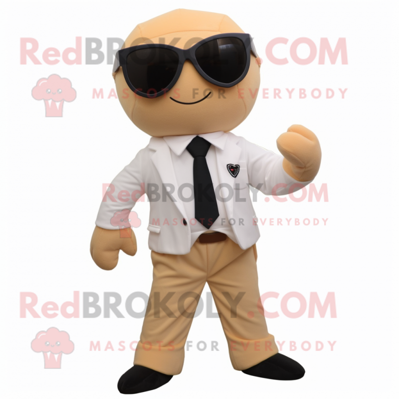 Tan Arrow Of Love mascot costume character dressed with a Suit Pants and Sunglasses Tan Arrow Of Love mascot costume character dressed with a Suit Pants and Sunglasses